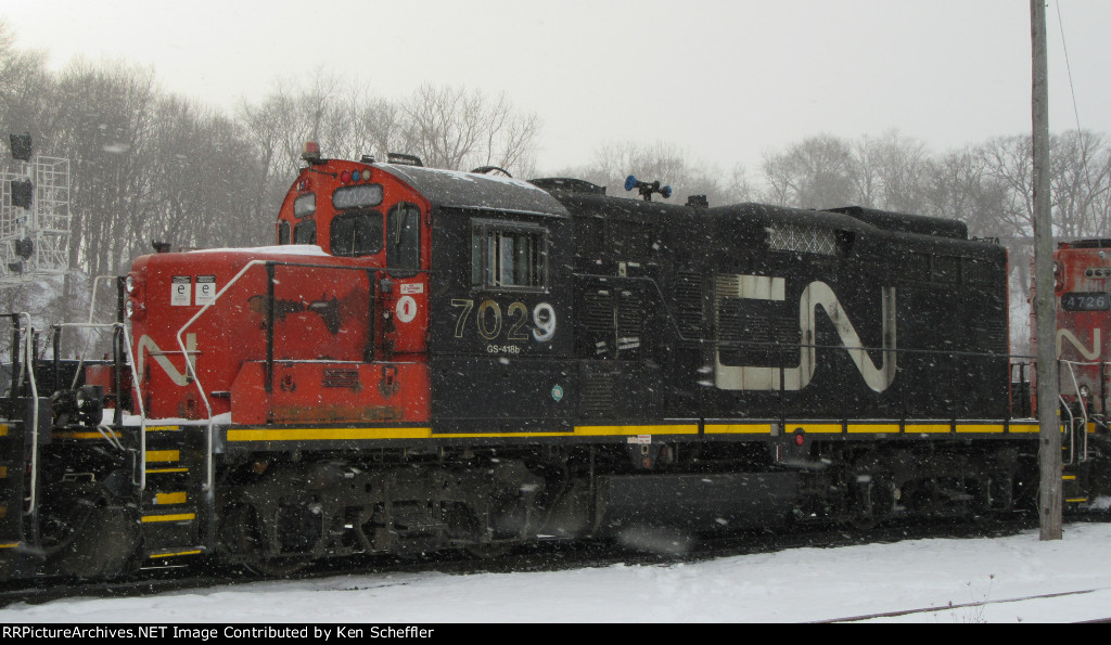 CN 7029